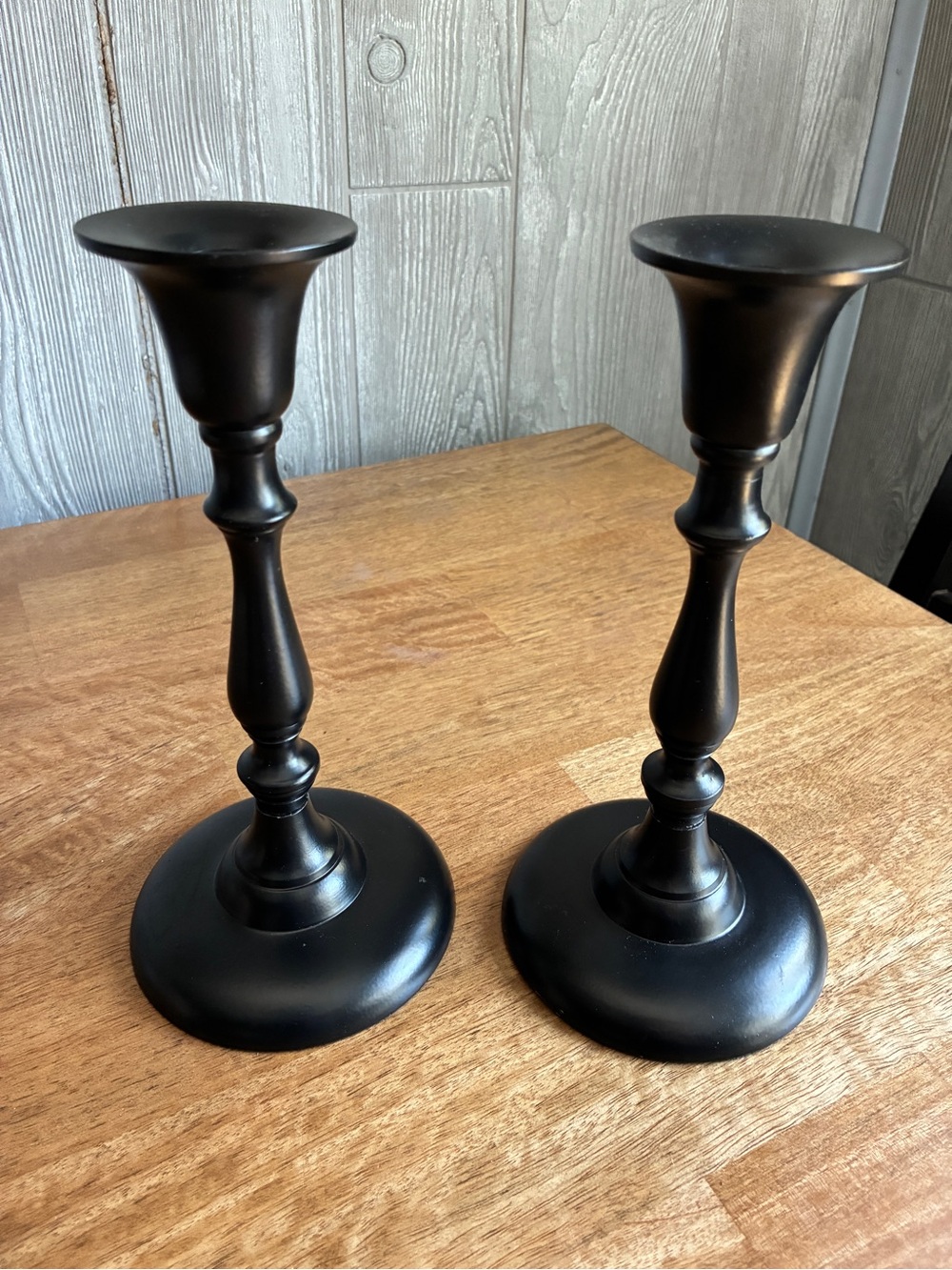 2 matte black taper candlestick holders, featuring a classic baluster stem 8.5”